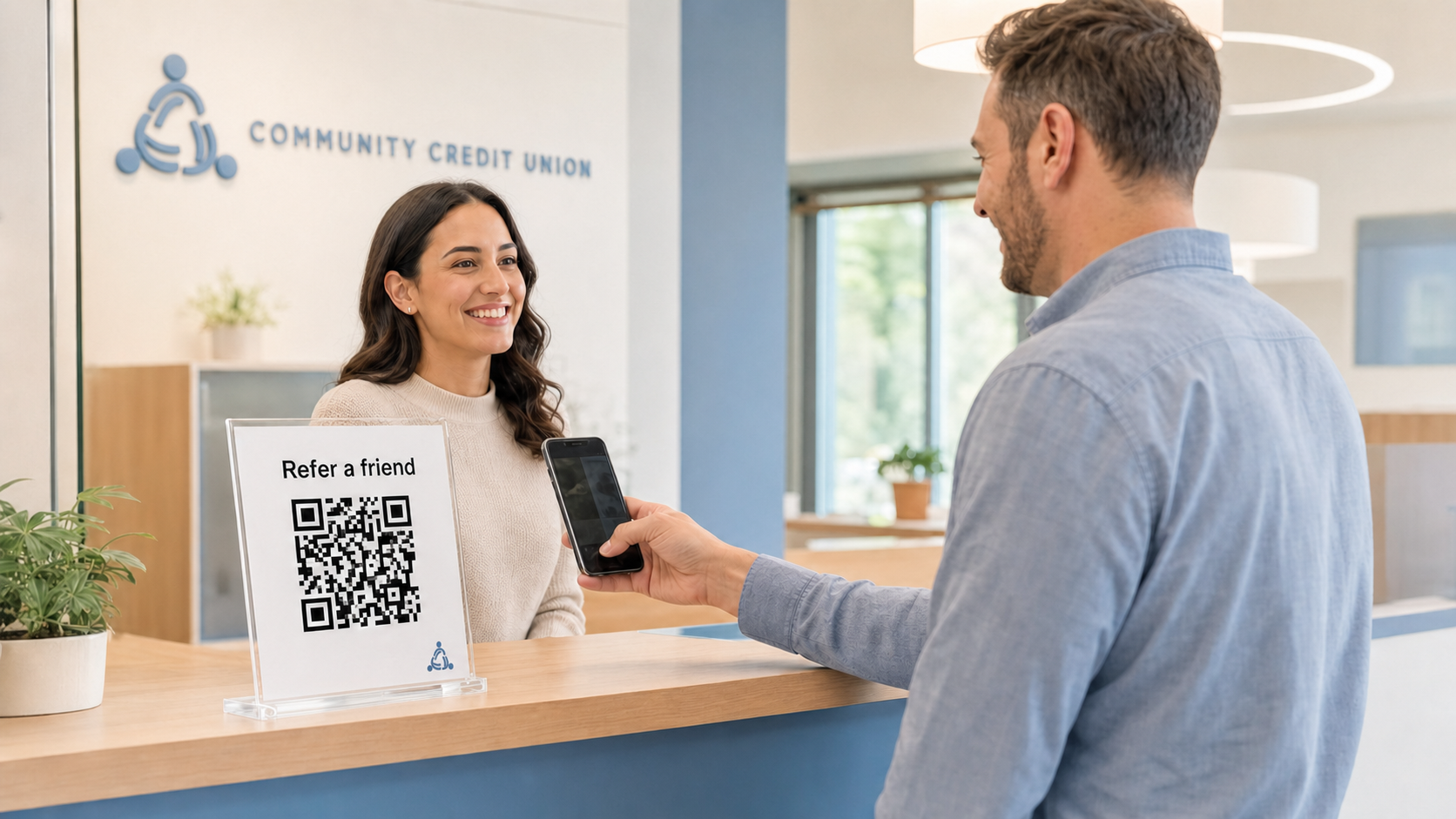 Credit union branch referral promotion using a QR code that opens a member's personal referral link.